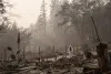 U.S. Army Sgt. Rodrigo Estrada of the California Army National Guard leads a team conducting search and debris clearing