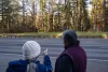 Carol Logan and Wilbur Slockish look across Highway 26 on Feb. 6, 2022 toward the Place of Big Big Trees, which was leveled