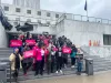 Supporters of an Oregon bill to expand access to abortion and gender-affirming care posed outside the state Capitol on
