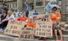 Alison Henken (left) of Boise and Heather Etcheverry of Kimberly brought their children to the Capitol on June 11, 2022, to