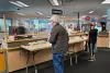 Elections workers address voter questions at the Marion County Clerk’s Office in Salem on Monday, May 16.