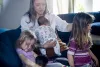 Caitlin Lombardi with her three daughters, from left, two-year-old Alma, five-week-old Pearl and four-year-old Maple in