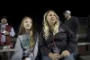 Morgan Brunner, 12, and her mom, Brenda, attend a recent Clackamah High School football game. Morgan received a concussion