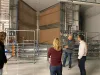 House Republican Leader Vikki Breese-Iverson, center, and Speaker Dan Rayfield, right, toured a Facebook data center in