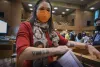 Secretary of State Shemia Fagan shows her “Vote” tattoo before ending candidate filing for the primary election on Tuesday,