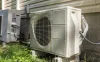 Washington state regulators want builders to install electric heat pumps, like the one pictured above, in new homes. A state