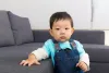 Asian baby boy at home