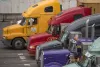 Semi-trucks seen at the Port of Seattle, Jan. 31, 2018.