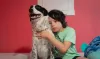 Javi Paz poses with their dog, Poky, in their Southeast Portland home on Aug. 16, 2023. Javier has had Poky for four years