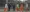 Inmates walk past correctional officers at the Washington Corrections Center in Shelton, Wash., in this photo from February