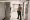 A Clackamas County sheriff's deputy stands in the hall of the Clackamas County Jail on Tuesday, Jan. 22, 2019, in Oregon