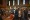 Candidates and their families watch names scroll across three large screens in the Oregon House chamber on Tuesday, March 8,