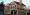 New House construction with romantic florishes and details, curved windows, dormers, eagle wind vane, North Matthews Beach,