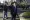 A supporter of former President Donald Trump is seen armed with a shotgun and knife during political clashes on December 12,