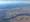 The Dalles Dam, which spans the Columbia River near Portland, with Mount Adams and Mount Rainier in the background. The dam
